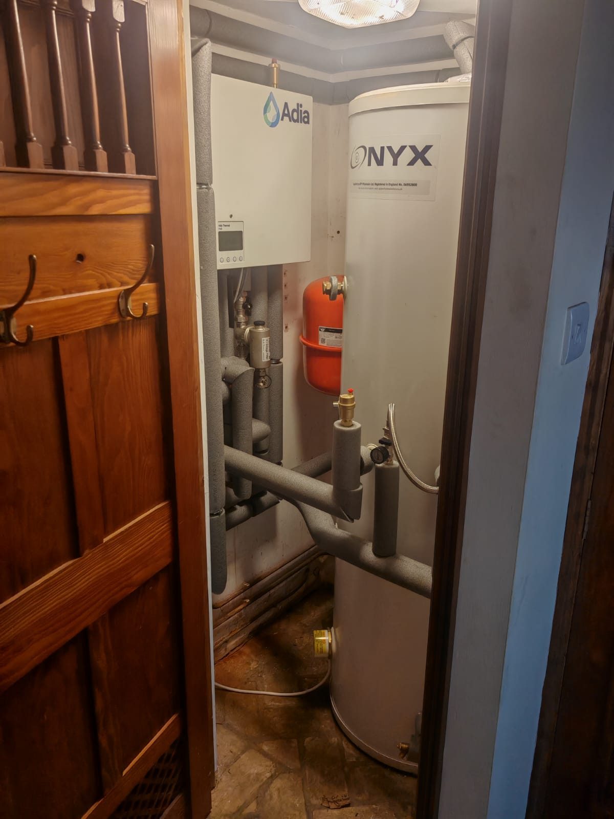 Onyx cylinder and Adia unit in the cupboard. Whole house air source heat pump by FB Gas, photo 08