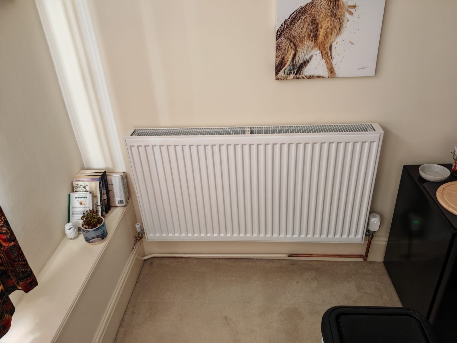 Radiator fitted into the corner of the dining room. Whole house air source heat pump by FB Gas, photo 11