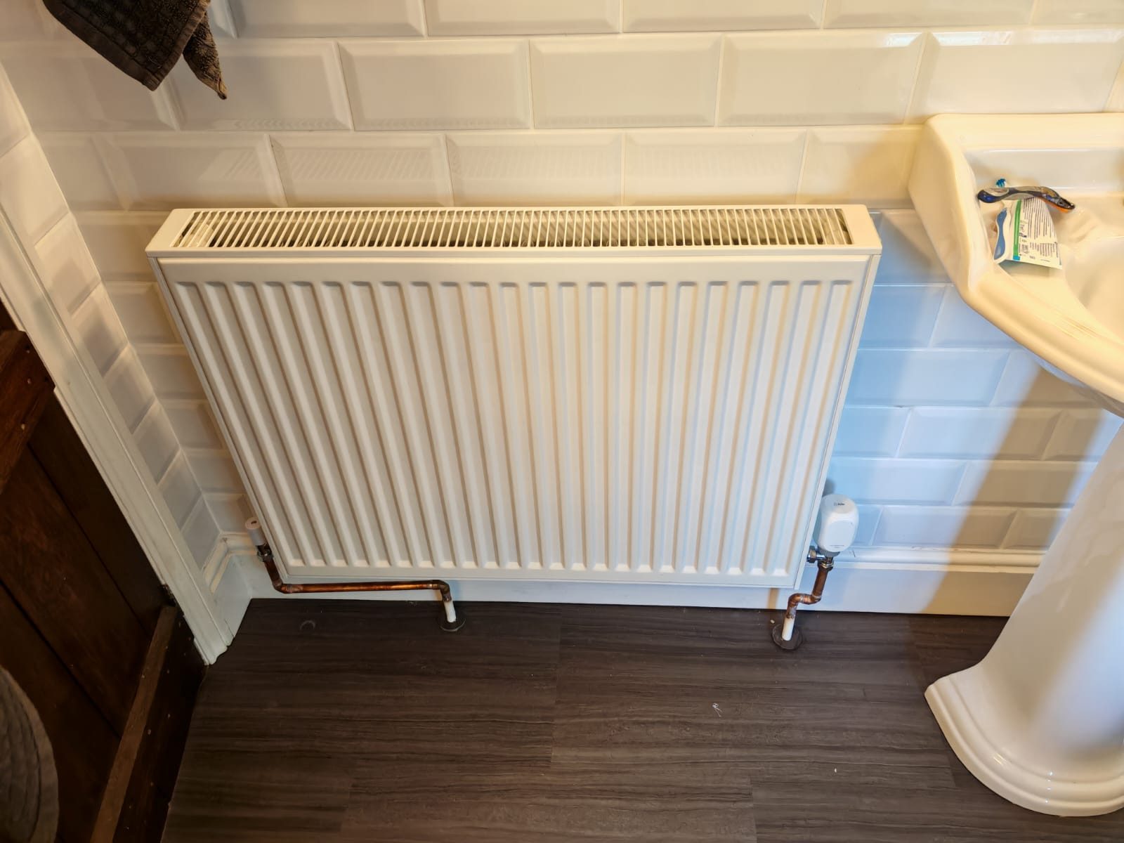 Bathroom radiator fitted beside the basin. Whole house air source heat pump by FB Gas, photo 13
