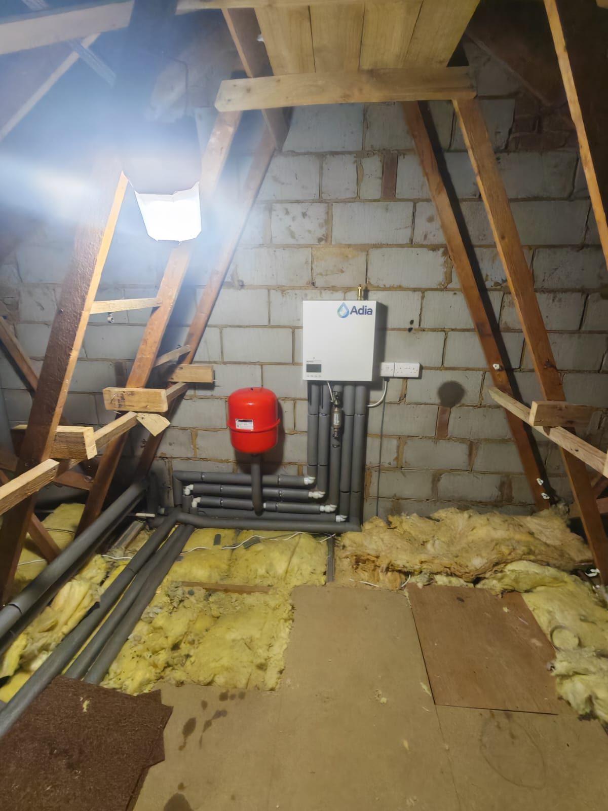 Adia heating unit and expansion vessel installed in a loft